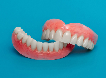 How to Properly Care for Your New Dentures